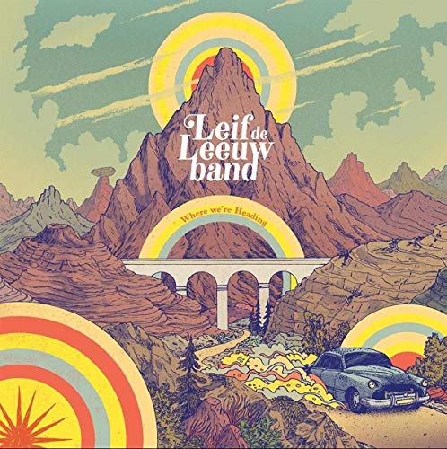 The image depicts a vibrant, stylized illustration of a mountainous landscape with a vintage car driving on a road. The scene is dominated by a large, brown mountain in the center, surrounded by smaller peaks and hills. A white bridge spans across the middle of the image, with the words "Leif de Leeuw band" written in white text above it. Below the bridge, the phrase "Where we're Heading" is inscribed in smaller yellow text within a yellow arch. In the foreground, a
