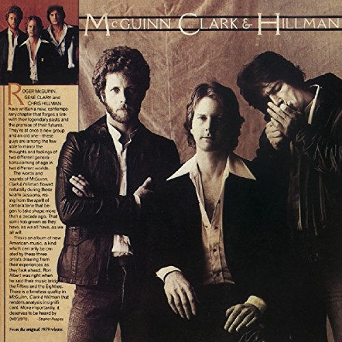 "CD cover featuring three men in dark clothing against a brown background."