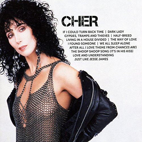 Cher's album cover featuring the artist in a metallic top and black jacket.
