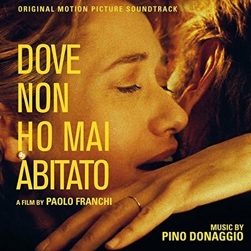 "CD cover with a man and woman embracing, yellow text."