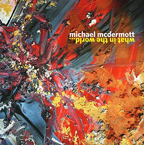 "Album cover with abstract red, orange, and black paint splatters and artist's name."