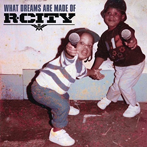 "CD cover with two young children holding microphones, grungy, distressed aesthetic."