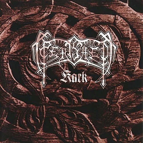 "CD album cover with ornate white text on a dark, wood-grain background."