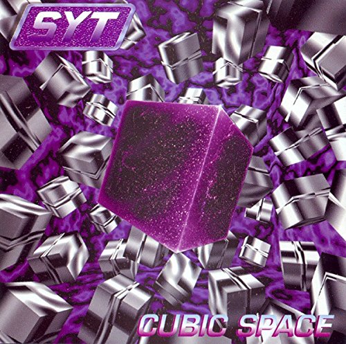 The image is a purple album cover with a central cube and metallic fragments. For accessibility purposes, a suitable alt text could be: "Purple album cover with a cube and silver fragments."