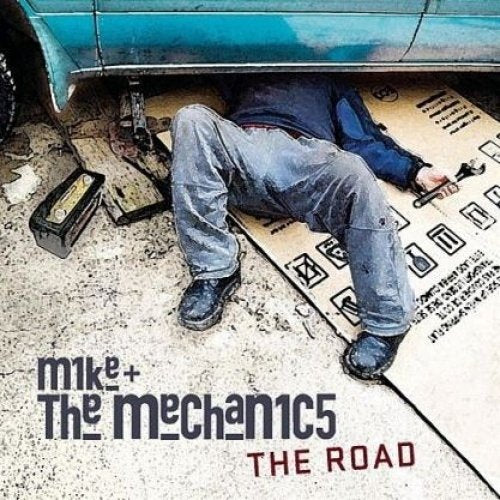 "Album cover with man lying under a blue car, with text 'Mike + The Mechanic5 The Road'."