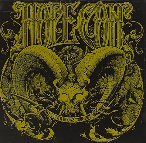 "Album cover art featuring a gold illustration on a black background, with skull and horns."