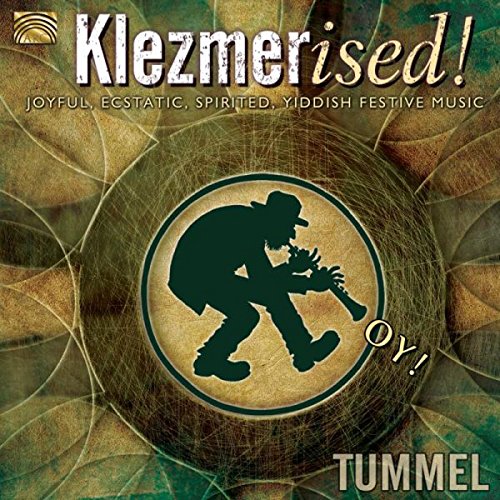 "CD cover with a silhouette of a man playing a clarinet, green and gold background."