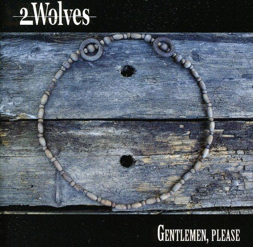 A beaded bracelet on weathered wooden planks with text "2 Wolves" and "Gentlemen, Please".