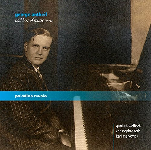 "CD cover featuring a man in a suit sitting at a piano."