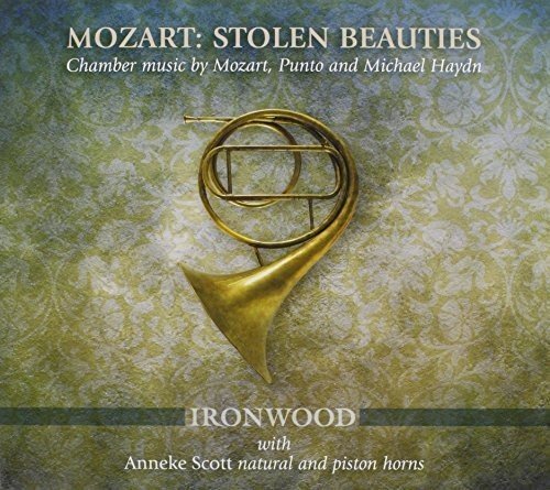 Alt text: CD cover featuring a brass horn against a green floral background.
