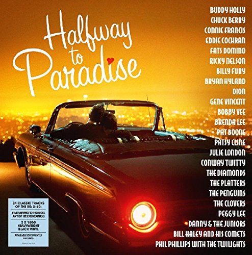 "Vinyl record cover featuring a couple in a convertible car at sunset."