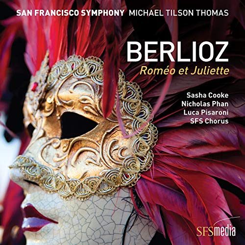 "CD cover featuring a gold Venetian mask with red feathers and cracked face."