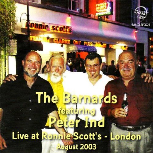 "CD cover featuring four men standing outside Ronnie Scott's jazz club."