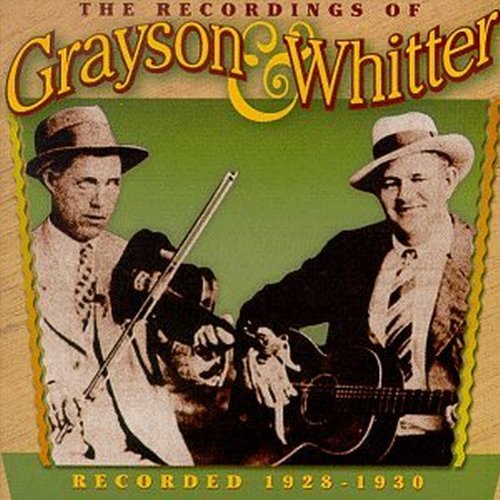 CD cover with sepia-toned image of two men holding instruments, green background.