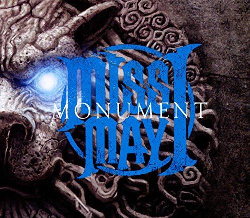 "Album cover with ornate stone creature and glowing eye, 'Miss May I Monument' text overlay."