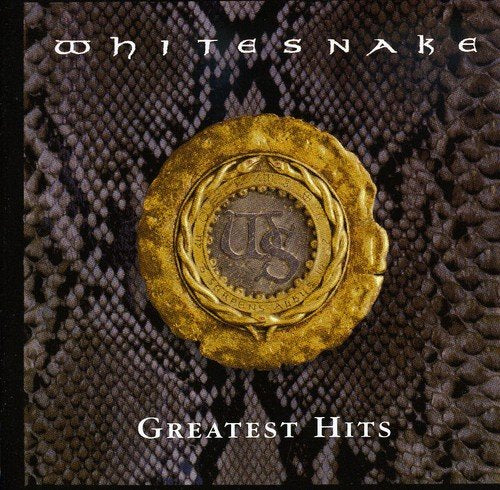 "CD cover with a gold seal on a snakeskin background, 'Whitesnake Greatest Hits' text."