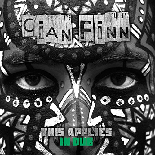 Black and white close-up of a face with tribal mask and text overlay.