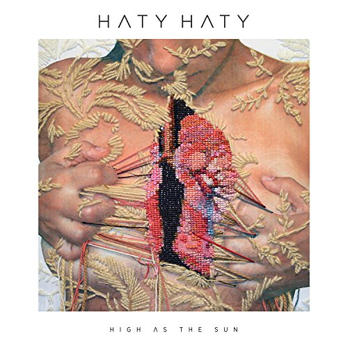 Album cover featuring a person with embroidered golden leaves and red stitching on their chest.