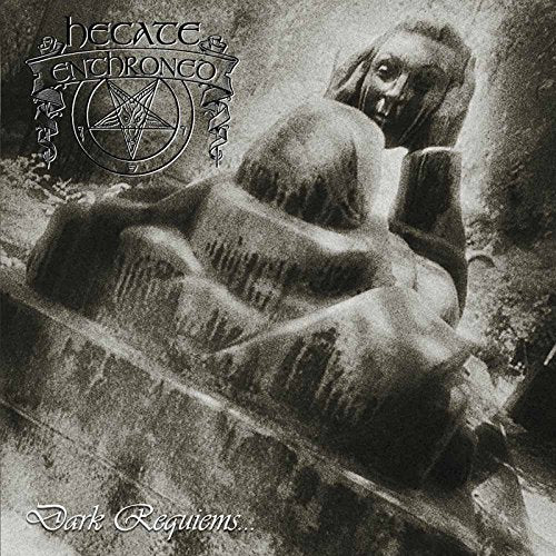 "Black and white album cover featuring a stone statue with a grotesque face."