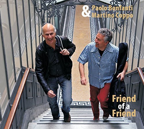 "Album cover featuring two men walking down a staircase, with text 'Friend of a Friend'."