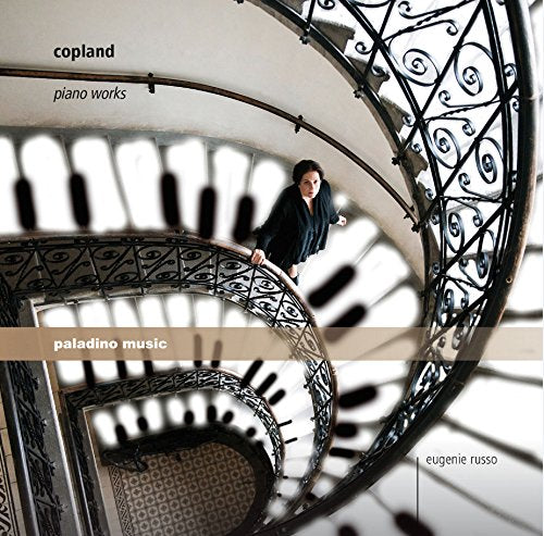 CD cover featuring a woman on a spiral staircase with "Copland piano works" text.