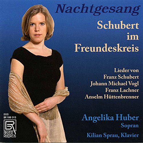 CD cover featuring a woman in a black dress against a blue background.