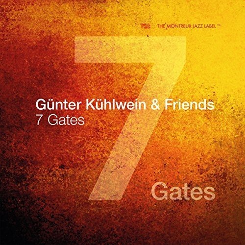 "CD cover with textured orange and yellow background, large '7' and white text."