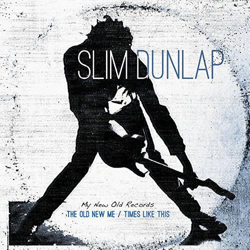 Vinyl record cover featuring a black silhouette of a man playing guitar.