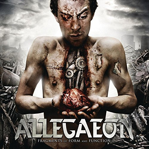 "Album cover art: man with mechanical torso holds a bloody heart, amidst destruction."