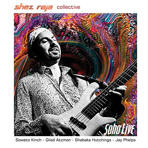 Album cover with a man playing guitar, colorful swirling background, white border.
