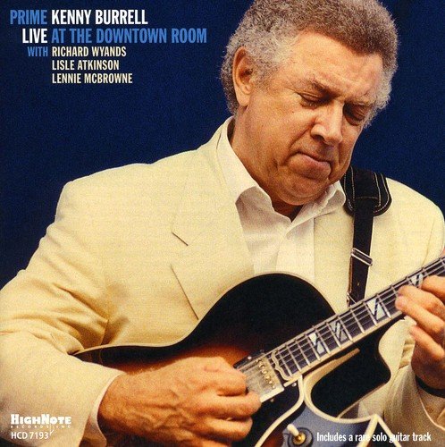 "Album cover featuring Kenny Burrell playing guitar, wearing a white jacket."