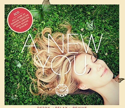 "A woman lies on grass with butterflies, surrounded by the title 'A New You'."