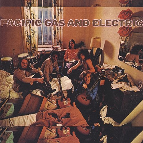 "CD cover art: messy bedroom scene with band members, guitars, and instruments."