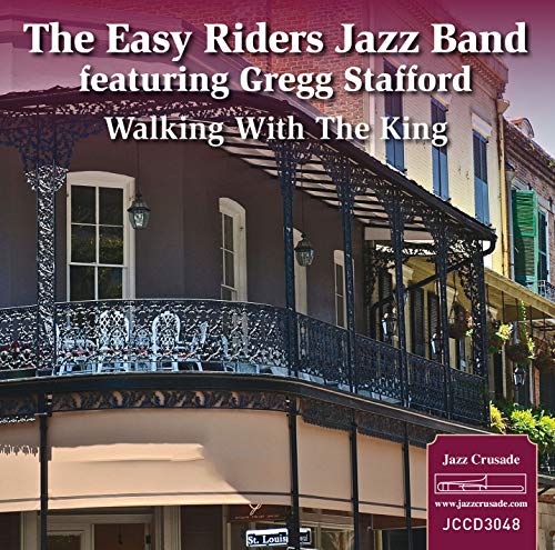 "Album cover featuring a New Orleans-style balcony and building with white text overlay."