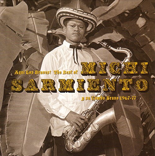 "Black and white album cover with man holding saxophone, wearing hat, surrounded by leaves."