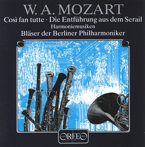 "CD cover with wind instruments on blue background, black border, and white text."
