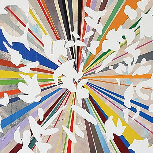 The image depicts a CD cover with a multicolored radial pattern and white silhouettes.