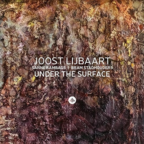 "Album cover with textured, earth-toned background and white text."