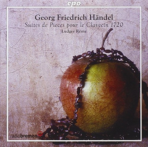 CD cover featuring a rotten apple on a pinkish surface.