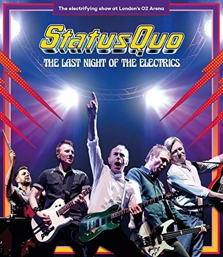 "Status Quo band performing on stage, playing guitars under bright lights."