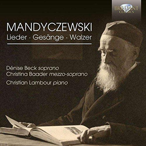 CD cover featuring a bearded man reading sheet music at a desk.