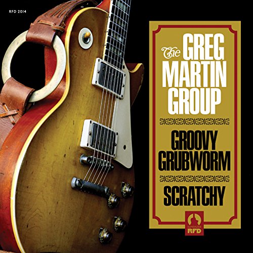 "Gold vinyl record album cover featuring a guitar and 'The Greg Martin Group' text."