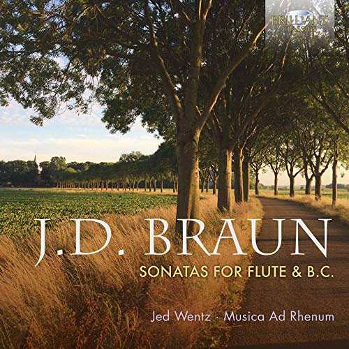 "Album cover with a tree-lined path and fields, featuring white and yellow text."
