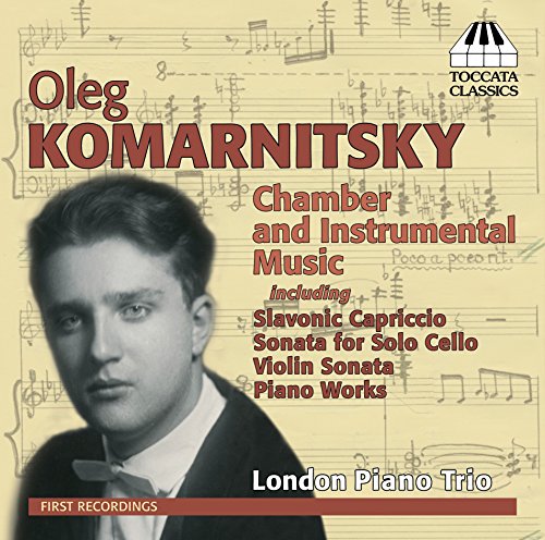 CD cover with a man's portrait and musical notes, titled "Oleg Komarnitsky Chamber and Instrumental Music".