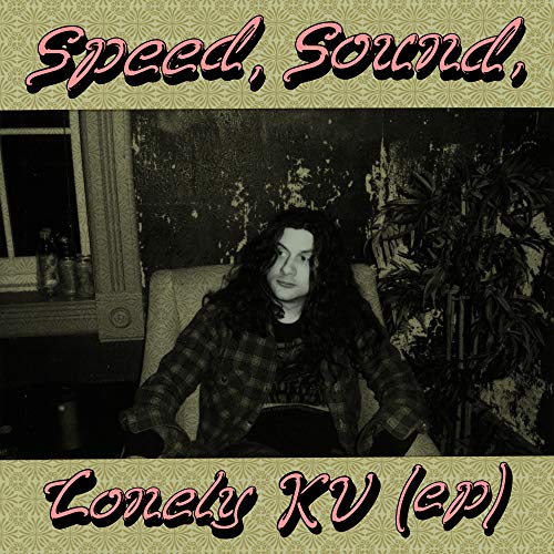 Album cover with man sitting in chair, surrounded by plants, with text overlay.