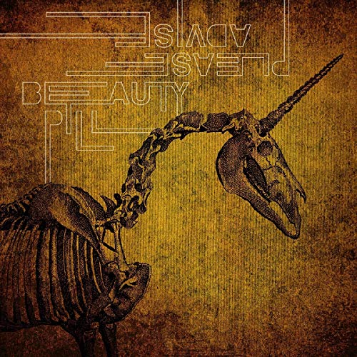 "Vinyl album cover featuring a rhinoceros skeleton with a chained skull, yellow-brown background."