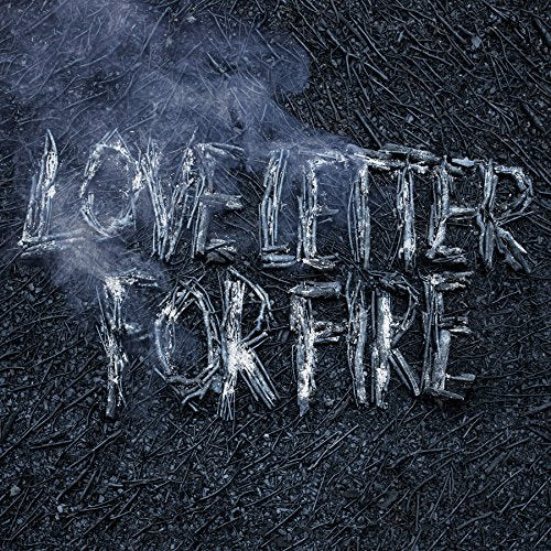 "Album cover with 'Love Letter For Fire' written in charred letters on a dark background."