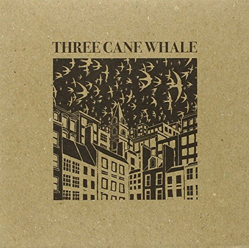 Brown cardboard CD cover with a black and beige cityscape illustration.