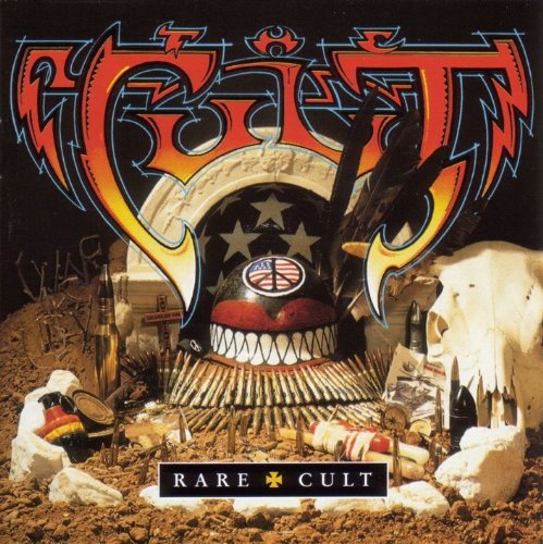 "Album cover with tribal mask, skull, and bones, surrounded by debris and 'Cult' in red."