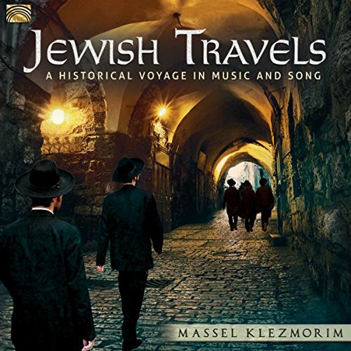 "CD cover featuring men in dark attire walking through an arched, cobblestone passageway."